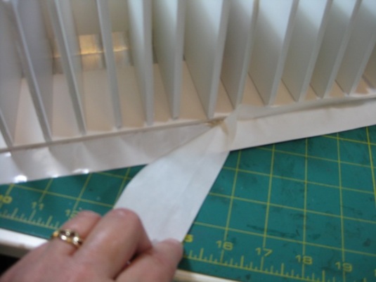 Peel the protective paper off fully